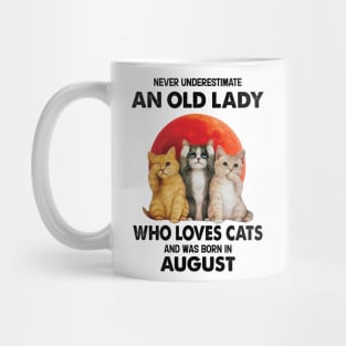 Never Underestimate An Old Lady Who Loves Cats And Was Born In August Mug